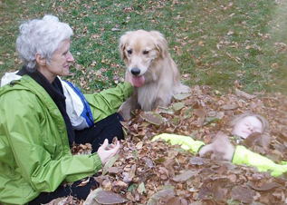 Autumn Leaves Sara, her granddaughter, and golden retriever Callie spoil Grandpapa Courtenays hard work with the leaves.