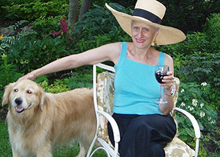 In the Garden Sara spends her 60th birthday in the garden with her dog and a glass of wine—courtesy of English publishers Hodder & Stoughton.